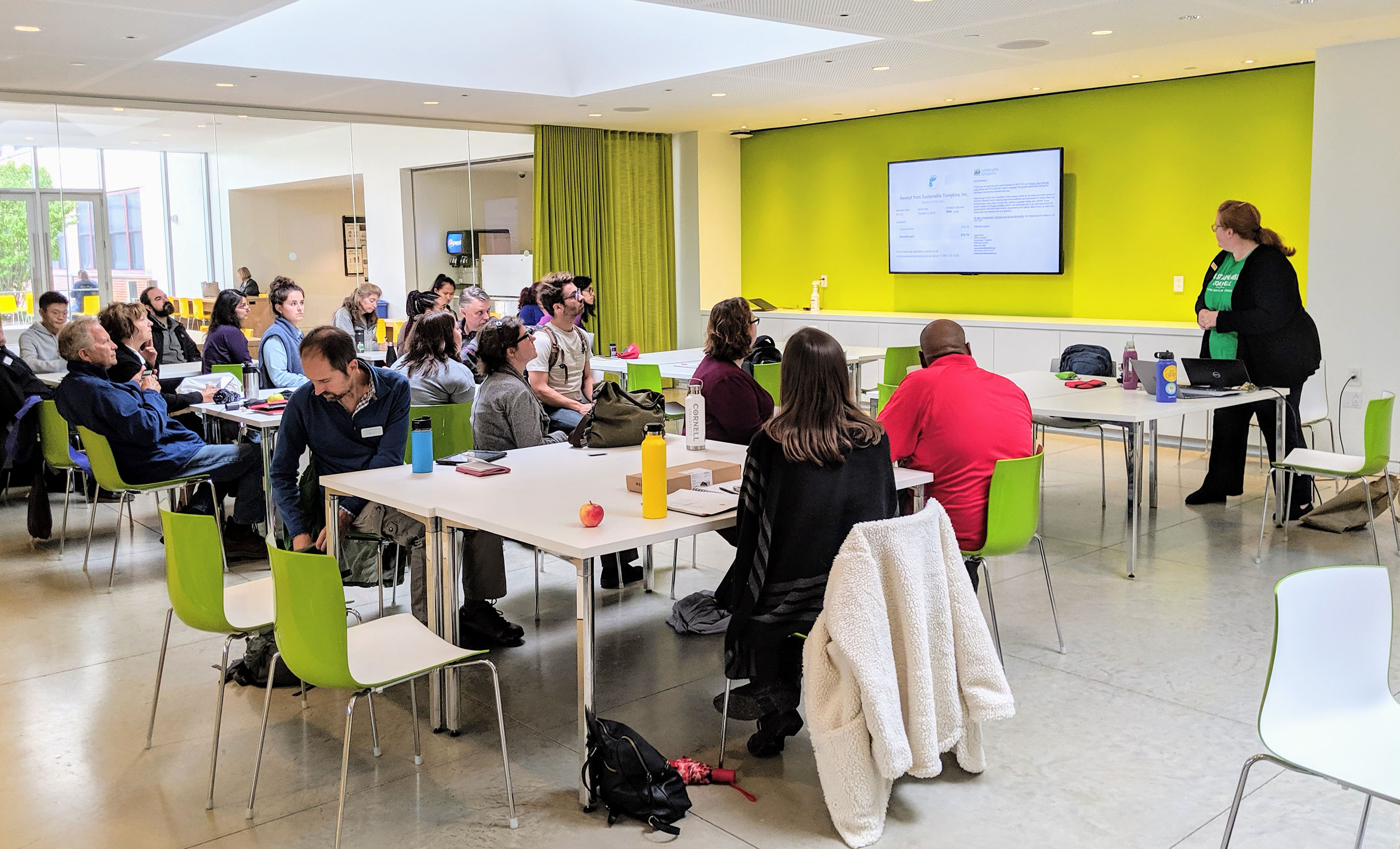 Staff watch a presentation on green team practices