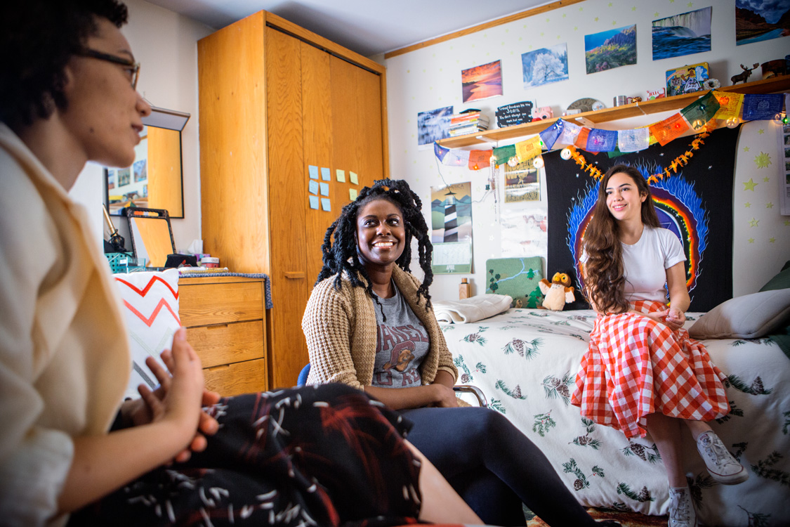Students hanging out in dorm room