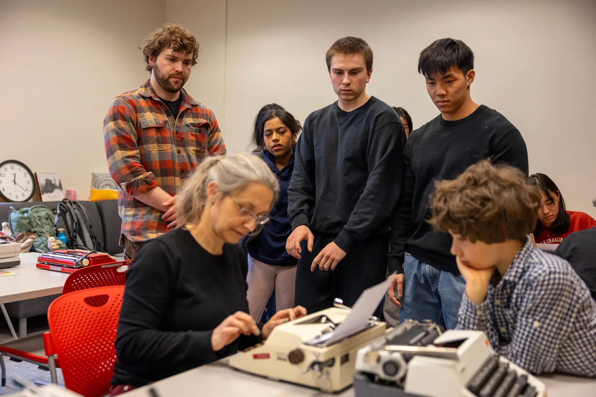 Grit Matthias Phelps, German language instructor, has her students use an old manual typewriter for writing assignments, without screens