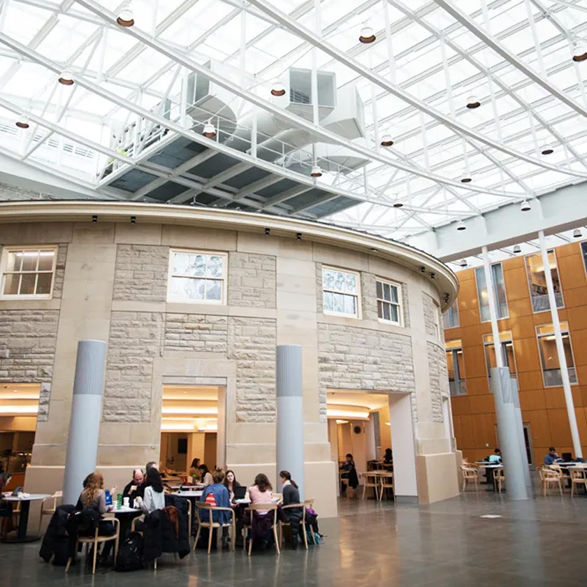 The glass-enclosed atrium of Klarman 