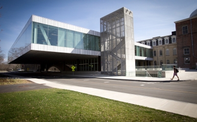 University Ave passing under the Milstein Hall overhang.