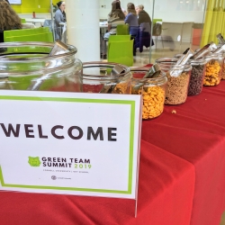 Welcome sign in front of jars of food