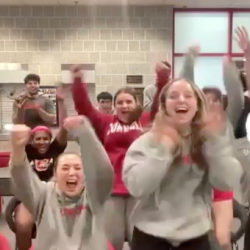 Student cheer upon hearing they won competition
