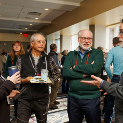 People chatting at the sustainabiity summit AY 2026