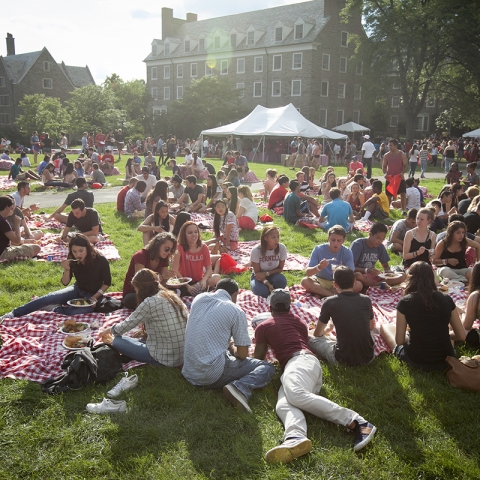 Crowd sitting outside