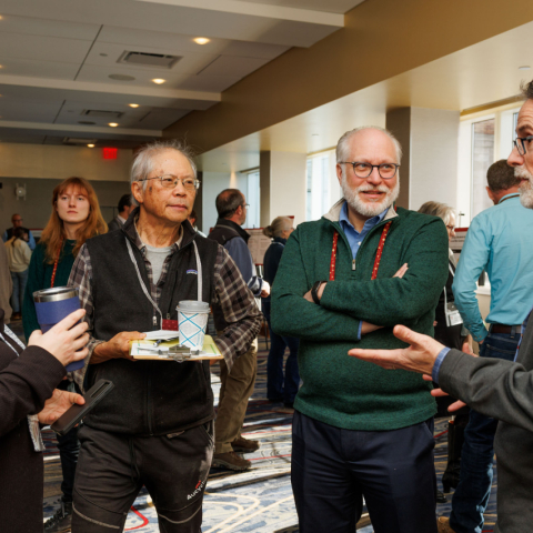 People chatting at the sustainabiity summit AY 2026