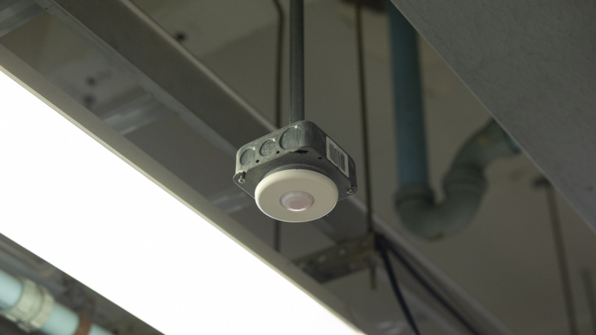 Laboratory space showing ventilation ducts and airflow control equipment.