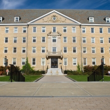 The stately main entrance of Martha Van Rensselaer Hall